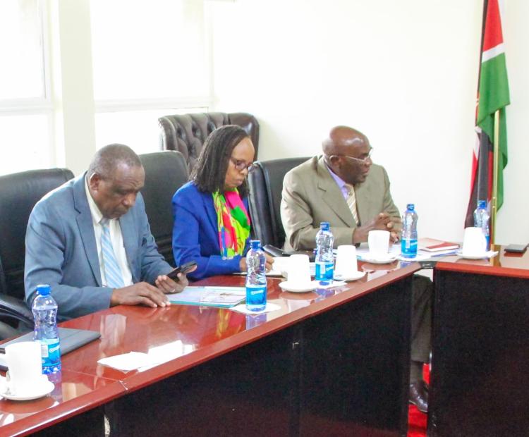 Education CS with KUCCPS Board Chair, CEO and other Board members